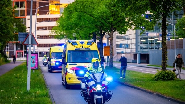 A convoy of ambulances driving through the streets in the Netherlands
