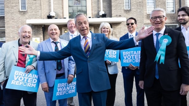 Nigel Farage, leader of Reform UK, and local councillors outside Havering Town Hall