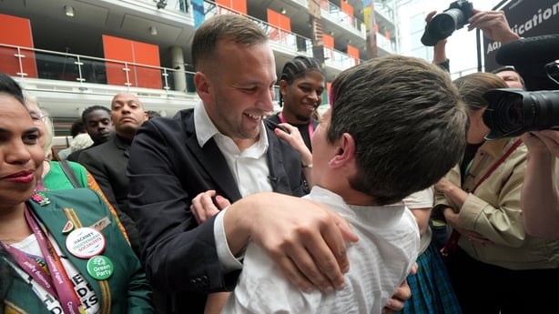 Green Party leader Zack Polanski congratulates candidate Zoe Garbett