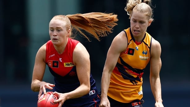 MELBOURNE, AUSTRALIA - NOVEMBER 15: Blaithin Mackin of the Demons and Teah Charlton of the Crows compete for the ball during the 2025 AFLW Second Semi Final match between the Melbourne Demons and the Adelaide Crows at Ikon Park on November 15, 2025 in Melbourne, Australia. (Photo by Michael Willson/