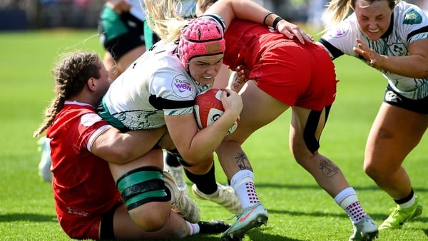 20 April 2025; Dorothy Wall of Ireland dives over to score a try during the Women's Six Nations Rugby Championship match between Wales and Ireland at Rodney Parade in Newport, Wales. Photo by Kian Abdullah/Sportsfile