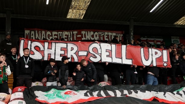 8 May 2026; Cork City supporters display a banner during the SSE Airtricity Men's First Division match between Cork City and UCD at Turner's Cross in Cork. Photo by Michael P Ryan/Sportsfile