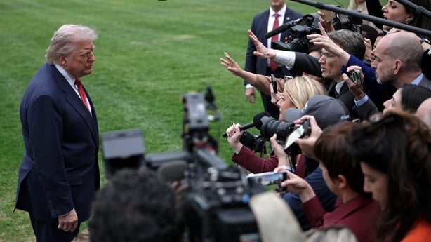 US President Donald Trump speaks to reporters