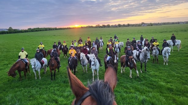 People take part in Darkness Into Kight on horses in Kildare