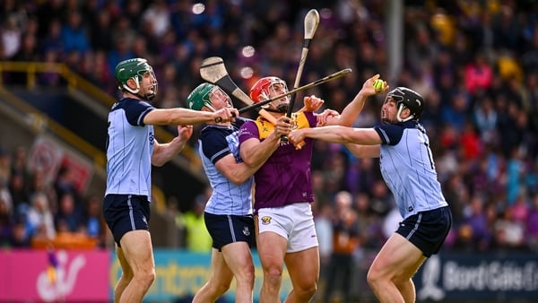 9 May 2026; Lee Chin of Wexford is tackled by Dublin players, from left, Chris Crummy, Fergal Whitely and Donal Burke during the Leinster GAA Senior Hurling Championship round 3 match between Wexford and Dublin at Chadwicks Wexford Park in Wexford. Photo