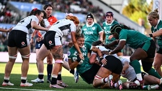 Erin King of Ireland is tackled by Georgia Evans of Wales the Women's 6 Nations Rugby Championship match between Ireland and Wales at Affidea Stadium in Belfast.