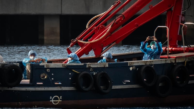 First passengers evacuated from virus-hit cruise ship