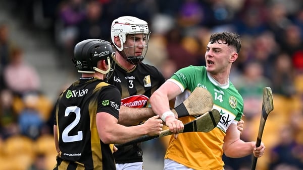 10 May 2026; Charlie Mitchell of Offaly tussles with Kilkenny players Mikey Butler, left, and Mikey Carey during the Leinster GAA Senior Hurling Championship Round 3 match between Offaly and Kilkenny at Glenisk O'Connor Park in Tullamore, Offaly. Photo by