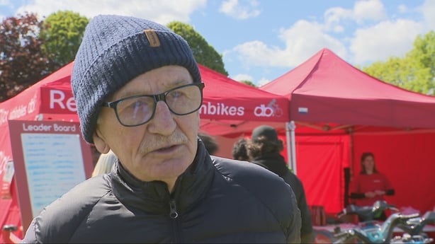 Jimmy Lally attending a Bike Week event in a park.