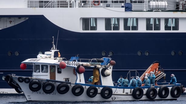 Passengers are evacuated by small boat from the MV Hondius in the Granadilla Port on May 10, 2026 in Tenerife, part of the Canary Islands, Spain
