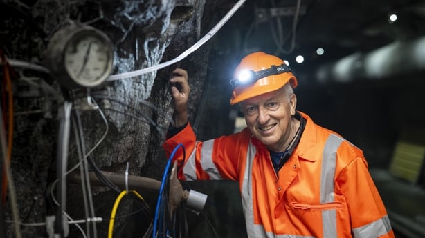 ETH Zurich professor of geology Domenico Giardini poses next to measuring instruments inside the BedrettoLab beneath the Swiss Alps 