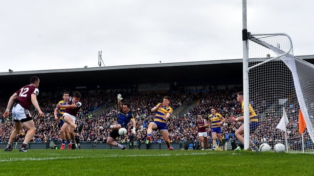 10 May 2026; Seán Kelly of Galway has a shot on goal saved by Roscommon goalkeeper Conor Carroll during the Connacht GAA Football Senior Championship final match between Roscommon and Galway at King & Moffatt Dr Hyde Park in Roscommon. Photo by Ben McShane/Sportsfile