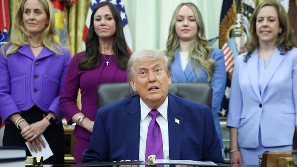 WASHINGTON, DC - MAY 11: U.S. President Donald Trump answers a question from a reporter during an event on maternal healthcare in the Oval Office of the White House on May 11, 2026 in Washington, DC. The Trump administration recently launched Moms.gov, a