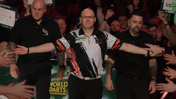 LONDON, ENGLAND - DECEMBER 19: Mickey Mansell of Northern Ireland walks on for his match on Day Nine of the 2025/26 Paddy Power World Darts Championship at Alexandra Palace on December 19, 2025 in London, England. (Photo by Andrew Redington/Getty Images)