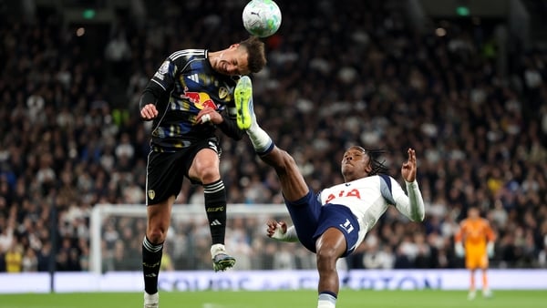 LONDON, ENGLAND - MAY 11: Mathys Tel of Tottenham Hotspur overhead kicks as Ethan Ampadu of Leeds United jumps to head the ball, leading to Leeds United being awarded a penalty during the Premier League match between Tottenham Hotspur and Leeds United at