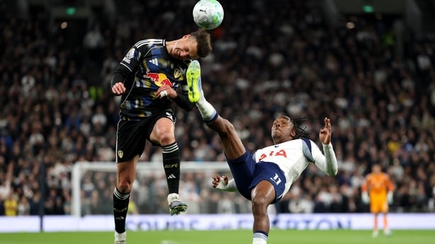 LONDON, ENGLAND - MAY 11: Mathys Tel of Tottenham Hotspur overhead kicks as Ethan Ampadu of Leeds United jumps to head the ball, leading to Leeds United being awarded a penalty during the Premier League match between Tottenham Hotspur and Leeds United at Tottenham Hotspur Stadium on May 11, 2026 in