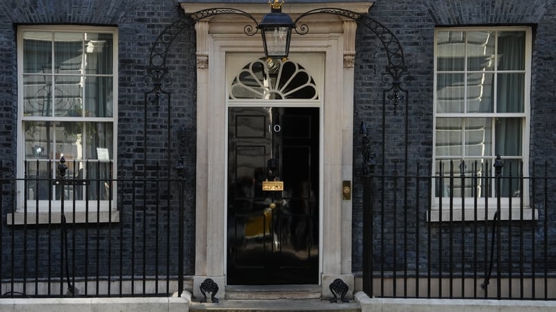 British PM faces crunch meeting as calls to quit grow