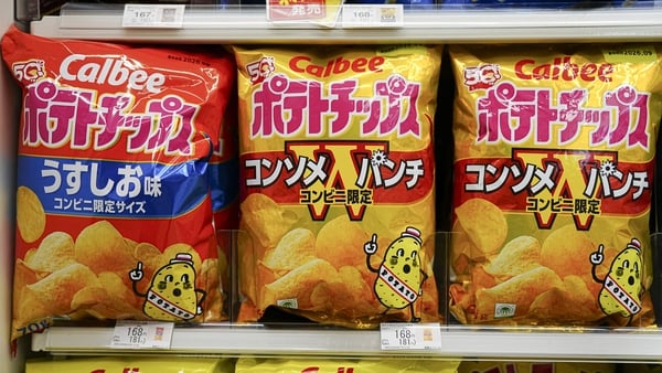 Bags of Calbee potato crisps are seen at a convenience store in Tokyo