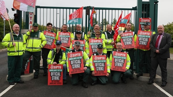 Members of the National Ambulance Service pictured on the picket line