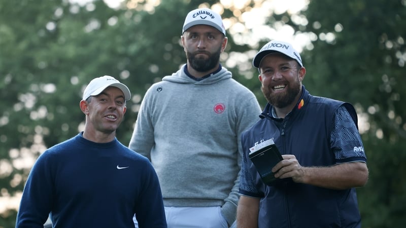 VIRGINIA WATER, ENGLAND - SEPTEMBER 11: Rory McIlroy of Northern Ireland, Jon Rahm of Spain and Shane Lowry of Ireland share a joke on day one of the BMW PGA Championship 2025 at Wentworth Golf Club on September 11, 2025 in Virginia Water, England. (Photo