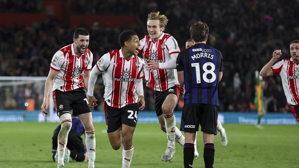 SOUTHAMPTON, ENGLAND - MAY 12: Flynn Downes of Southampton rushes to congratulate team-mate Shea Charles after he scores a goal to make it 2-1 in extra-time during the Sky Bet Championship Play Off Semi Final Second Leg match between Southampton and Middl