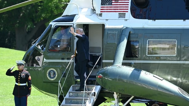 US President Donald Trump boards the Marine One plane