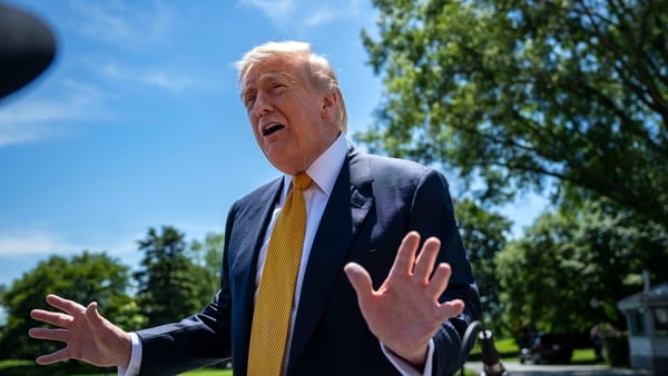 US President Donald Trump speaks to members of the media