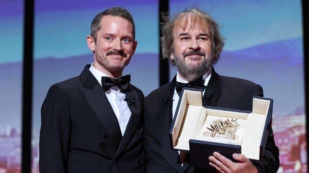 Elijah Wood and Peter Jackson on stage during the opening ceremony of the 79th annual Cannes Film Festival at Palais des Festivals on 12 May, 2026 in Cannes, France. (Photo by Stephane Cardinale - Corbis/Corbis via Getty Images)