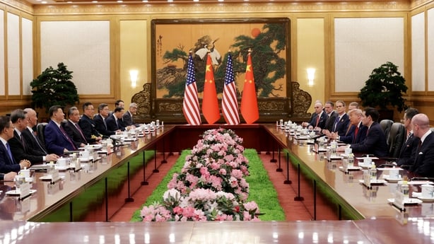 Xi hails trade progress with Trump, sends Taiwan warning