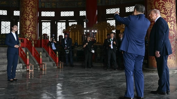 China's President Xi Jinping and US President Donald Trump visit the Temple of Heaven in Beijing, China