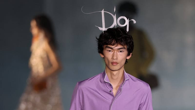 A model walks the runway during the Dior 2027 Cruise collection fashion show at the Los Angeles County Museum of Art (LACMA) in Los Angeles on May 13, 2026. (Photo by Patrick T. Fallon / AFP)
