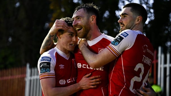 Ryan Edmondson of St Patrick's Athletic, centre, celebrates with teammates Kian Leavy, left, and Luke Turner after scoring their side's third goal during the SSE Airtricity Men's Premier Division match between St Patrick's Athletic and Bohemians at Richmo