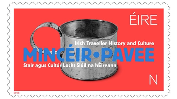 Image shows an An Post stamp with a picture of a tin mug against a bright red background.