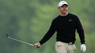 Rory McIlroy of Northern Ireland reacts after playing a shot on the tenth hole during the first round of the PGA Championship at Aronimink Golf Club on May 14, 2026 in Newtown, Pennsylvania.