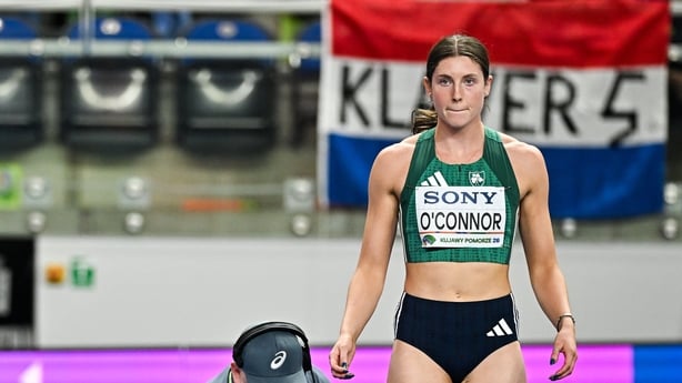 22 March 2026; Kate O'Connor of Ireland prepares to compete in the Women's high jump event, as officials fix the track, in the Women's Pentathlon during day three of the World Athletics Indoor Championships at Kujawsko-Pomorska Arena in Torun, Poland. Photo by Sam Barnes/Sportsfile