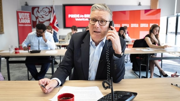 UK Prime Minister Keir Starmer on the phone in the call centre at Labour Party headquarters in London, on the last day of campaigning ahead of the elections 