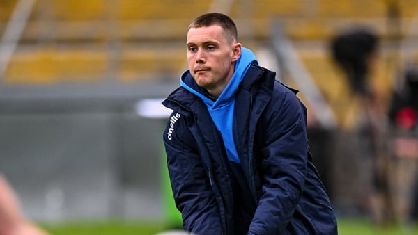 Injured Dublin footballer Con O'Callaghan helping with the warm-up before the Leinster semi-final against Louth