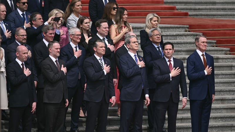 Group of politicans and company CEO stand on the steps of the Great Hall of the People in Beijing