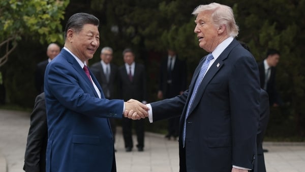 US President Donald Trump (R) shakes hands with China’s President Xi Jinping as he leaves after a visit to Zhongnanhai Garden in Beijing on May 15, 2026. (Photo by Evan Vucci / POOL / AFP)