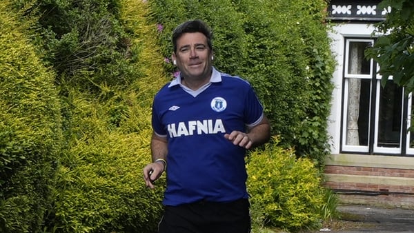 Mayor of Greater Manchester Andy Burnham outside his house in Warrington