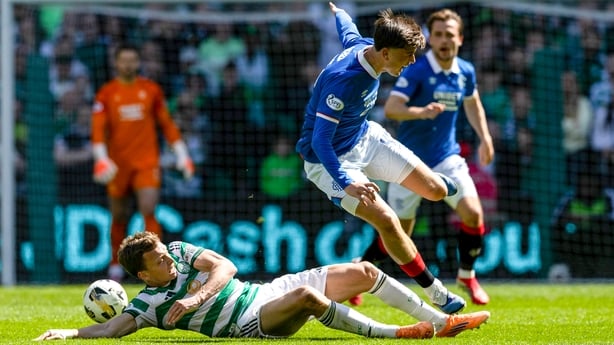 GLASGOW, SCOTLAND - MAY 10: Celtic's Alistair Johnston fouls Rangers Mikey Moore during a William Hill Premiership match between Celtic and Rangers at Celtic Park, on May 10, 2026, in Glasgow, Scotland. (Photo by Craig Williamson/SNS Group via Getty Images)