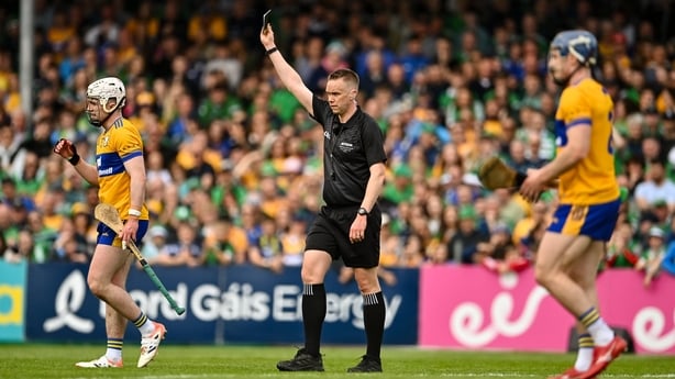 3 May 2026; Adam Hogan of Clare is shown a black card by referee Michael Kennedy during the Munster GAA Senior Hurling Championship Round 3 match between Clare and Limerick at Zimmer Biomet Páirc Chíosóg in Ennis, Clare. Photo by Tom Beary/Sportsfile