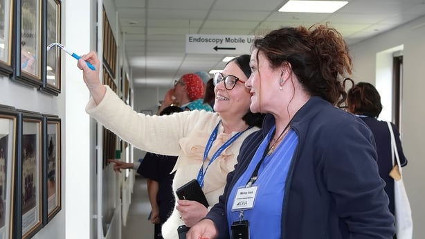 Niamh Sheehan, Director of Nursing at UHW, indicating where she appears on her year's graduation photo