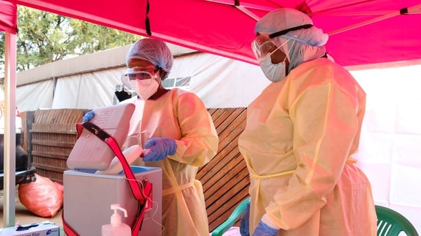 KAMPALA, UGANDA - FEBRUARY 3: Health workers prepare doses of a trial vaccine at Mulago Referral Hospital for medical staff and contacts of a man who died after testing positive for the Sudan strain of the Ebola virus, on February 3, 2025 in Kampala, Uganda. The Uganda Ministry of Health declared an