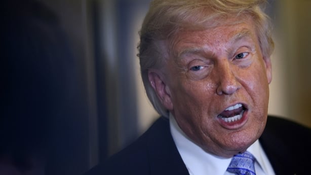 Donald Trump briefs reporters on Air Force One