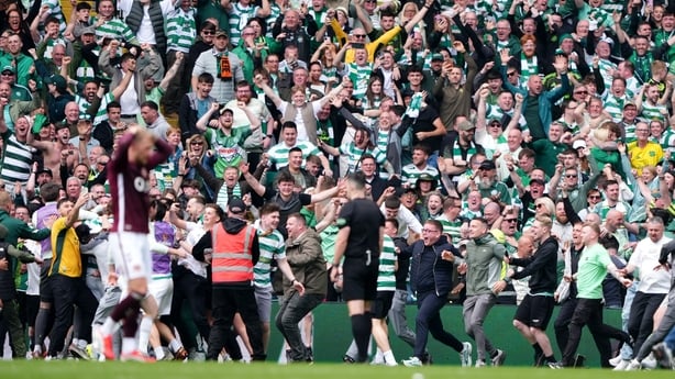 Celtic fans celebrate their sides victory over Heart of Midlothian 