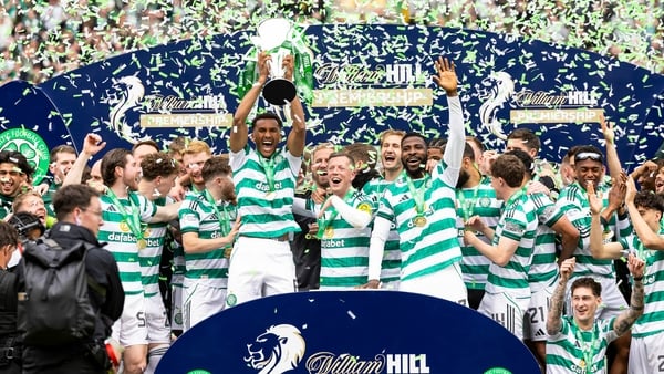 GLASGOW, SCOTLAND - MAY 16: Celtic's Auston Trusty lifts the William Hill Premiership trophy during a William Hill Premiership match between Celtic and Heart of Midlothian at Celtic Park, on May 16, 2026, in Glasgow, Scotland. (Photo by Ross Parker/SNS Gr