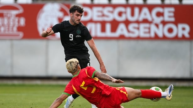 16 May 2026; Tom Cannon of Republic of Ireland has a shot on goal despite the tackle of Kayden Harrack of Grenada during the international friendly match between Republic of Ireland and Grenada at Estadio Nueva Condomina in Murcia, Spain. Photo by Stephen McCarthy/Sportsfile
