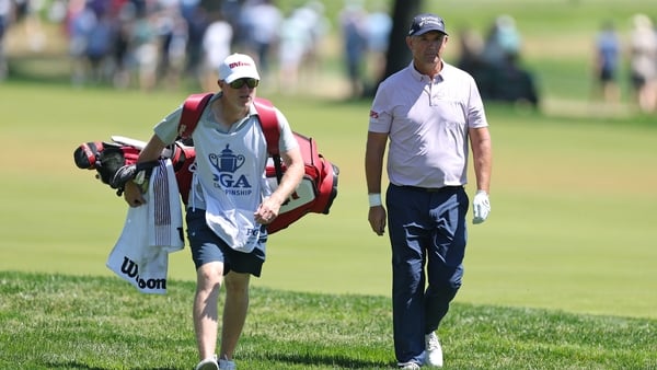 NEWTOWN, PENNSYLVANIA - MAY 16: Padraig Harrington of Ireland and his caddie Ronan Flood walk the 12th hole during the third round of the PGA Championship at Aronimink Golf Club on May 16, 2026 in Newtown, Pennsylvania. (Photo by Andrew Redington/Getty Im