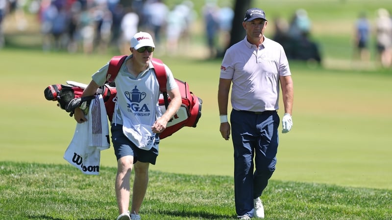 NEWTOWN, PENNSYLVANIA - MAY 16: Padraig Harrington of Ireland and his caddie Ronan Flood walk the 12th hole during the third round of the PGA Championship at Aronimink Golf Club on May 16, 2026 in Newtown, Pennsylvania. (Photo by Andrew Redington/Getty Im
